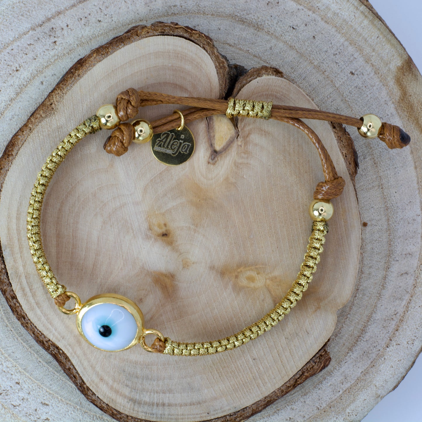 Pulsera de Ojo Turco con Tejido en Macramé Dorado