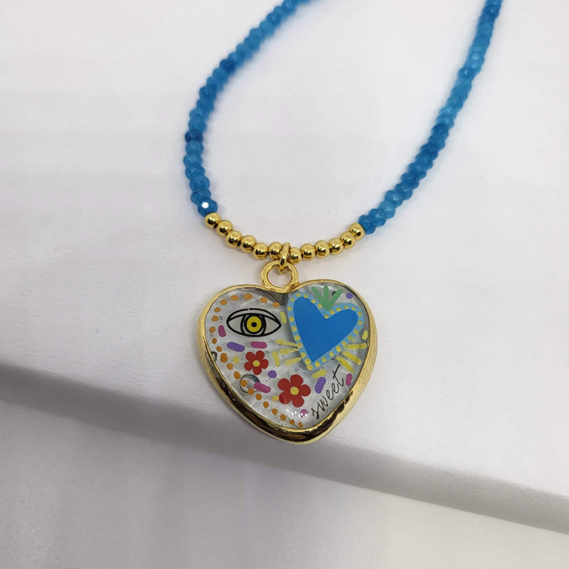 Collar de Jade Facetado Azul con Corazón de Murano Engastado en Baño de Oro